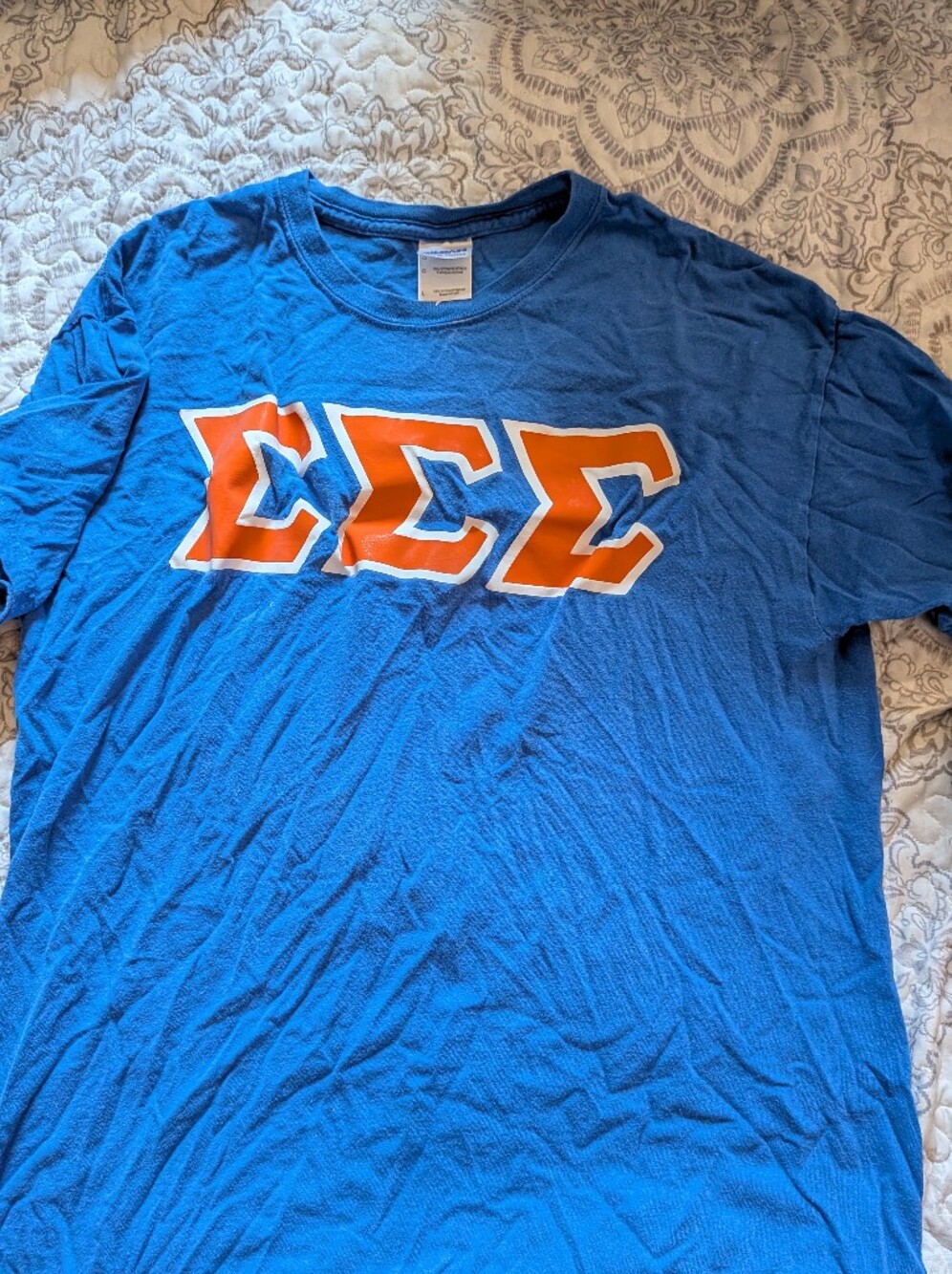 Blue T-shirt with Greek Letters